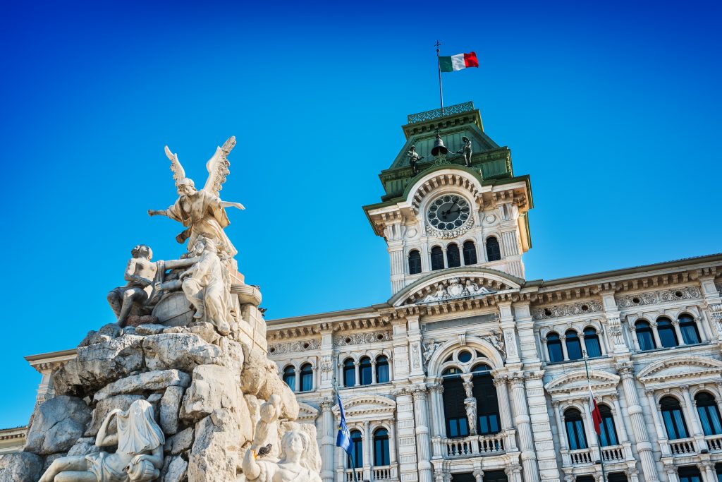 Fountain and Town Hall in Trieste, Italy